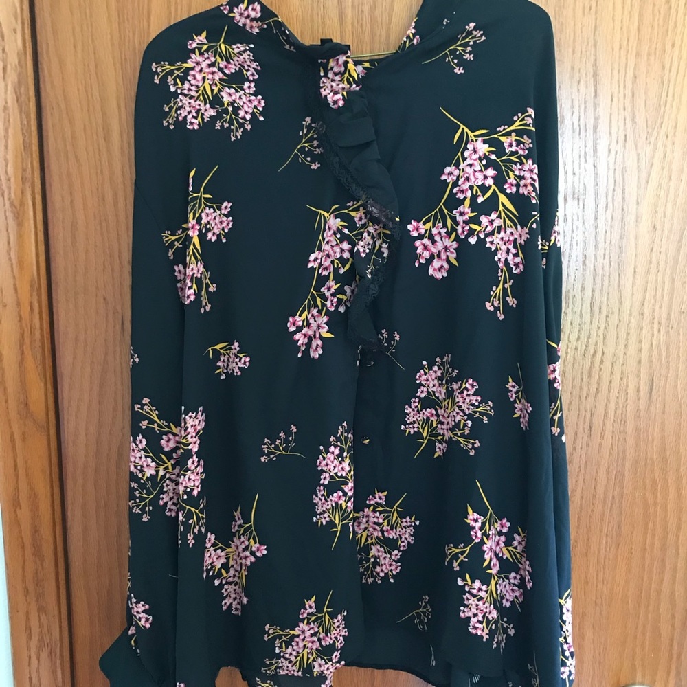 Plus size long sleeve floral blouse.